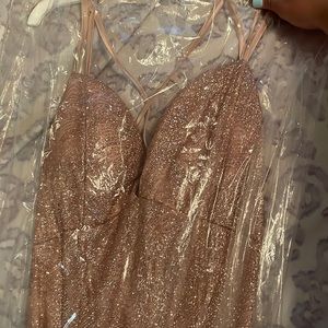 Rose Gold junior prom dress! Worn once and has a pretty lace up back.